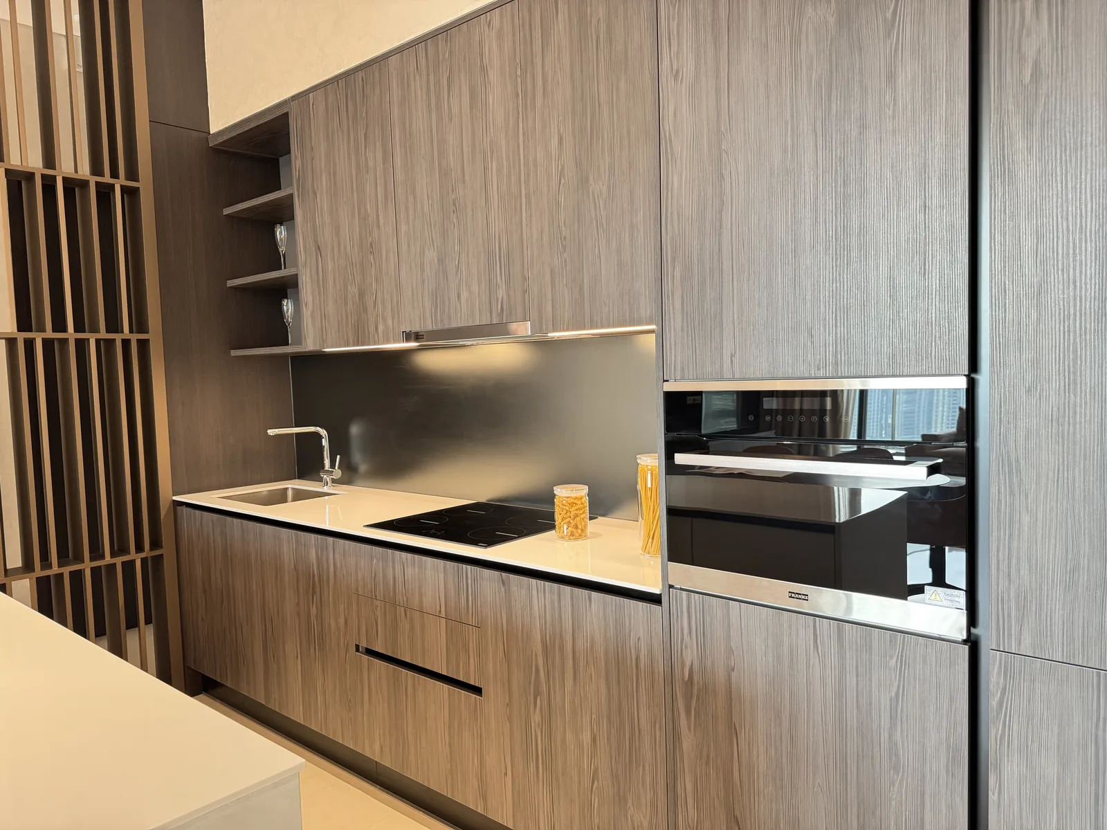 Regent Residences Jakarta show unit kitchen with integrated appliances