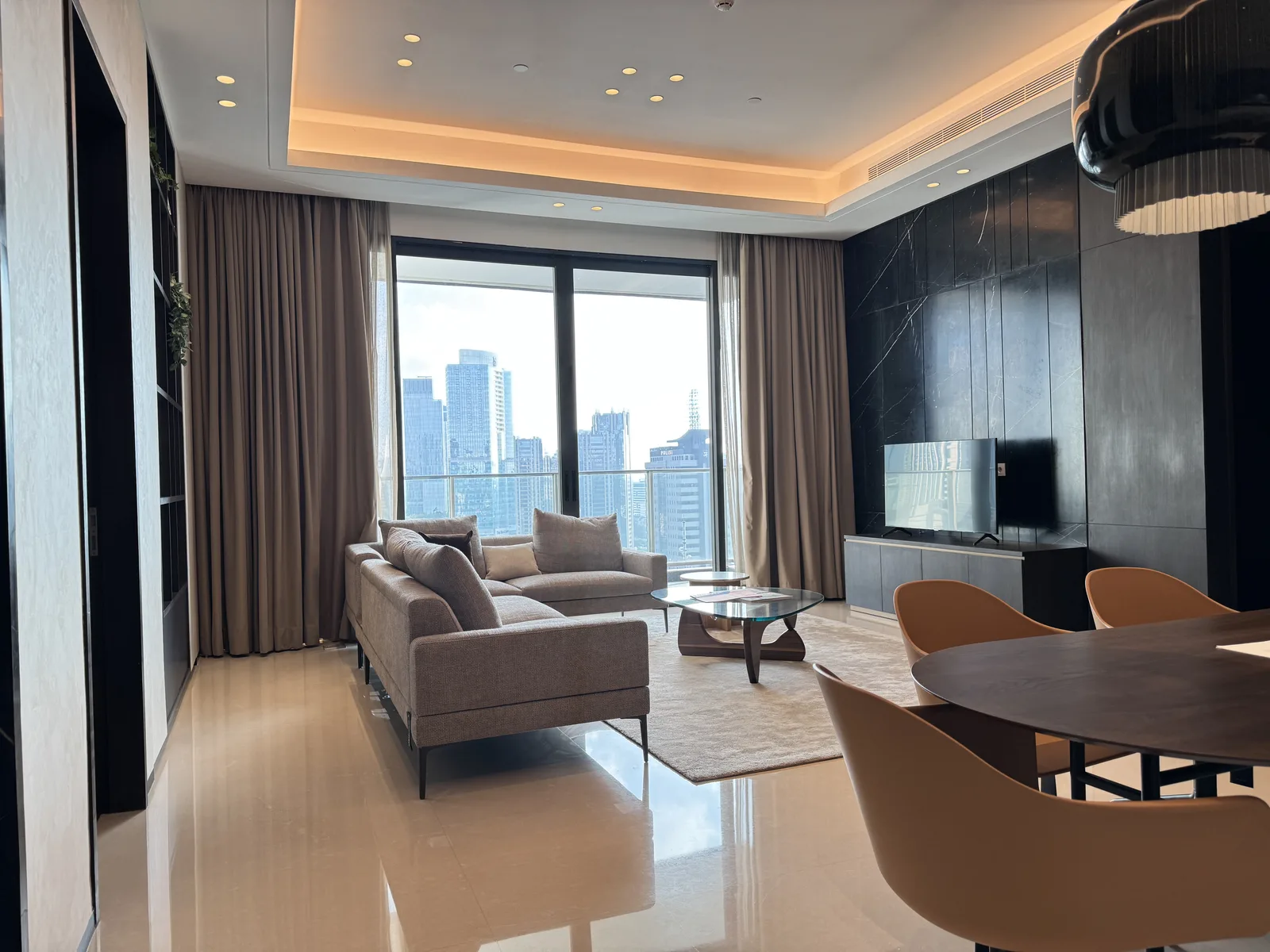 Regent Residences Jakarta show unit living room with Jakarta CBD skyline view